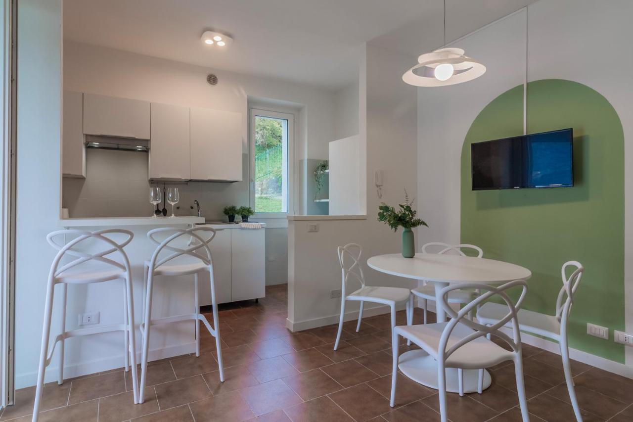 Ninfea Apartments By Wonderful Italy Lezzeno Bagian luar foto