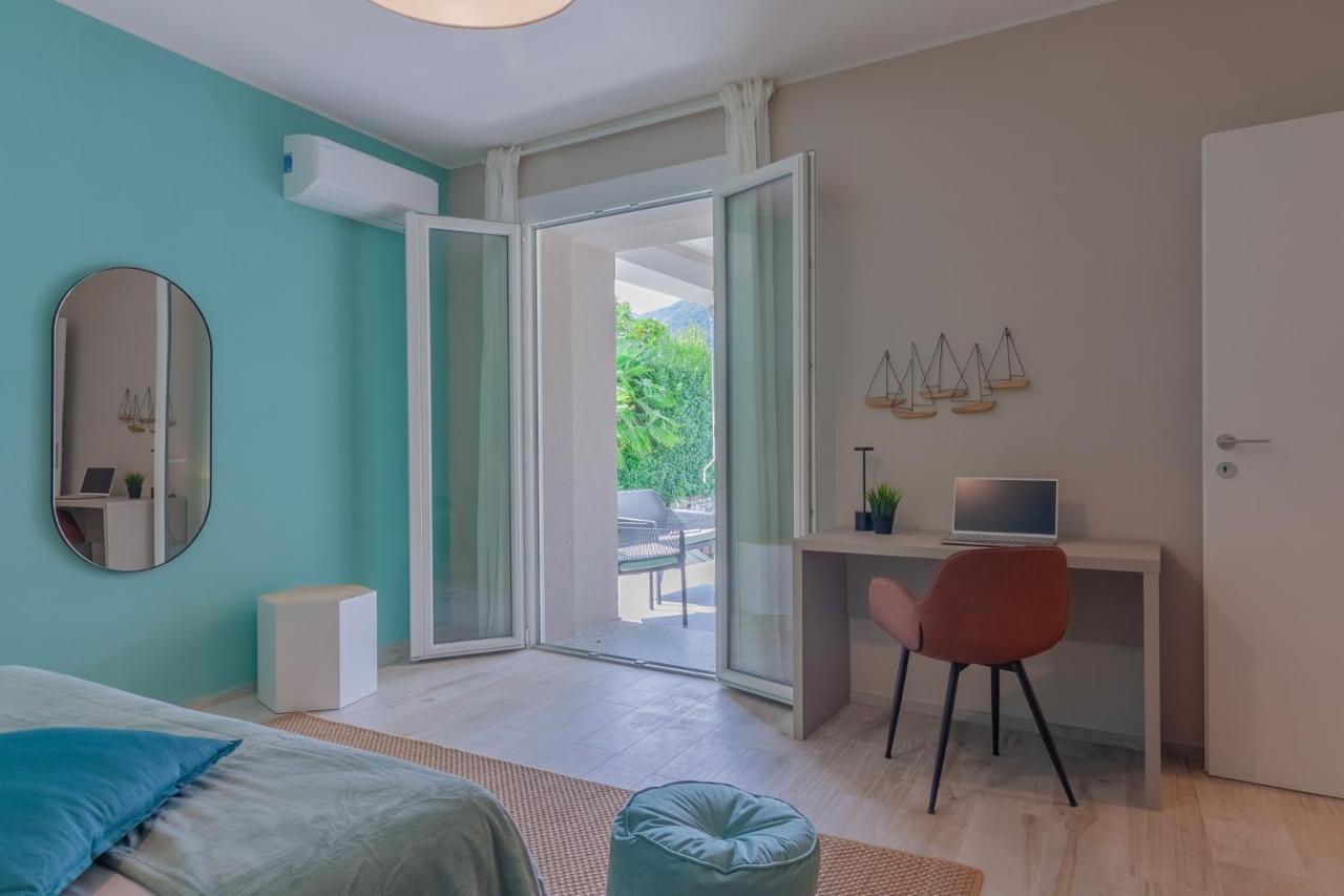 Ninfea Apartments By Wonderful Italy Lezzeno Bagian luar foto