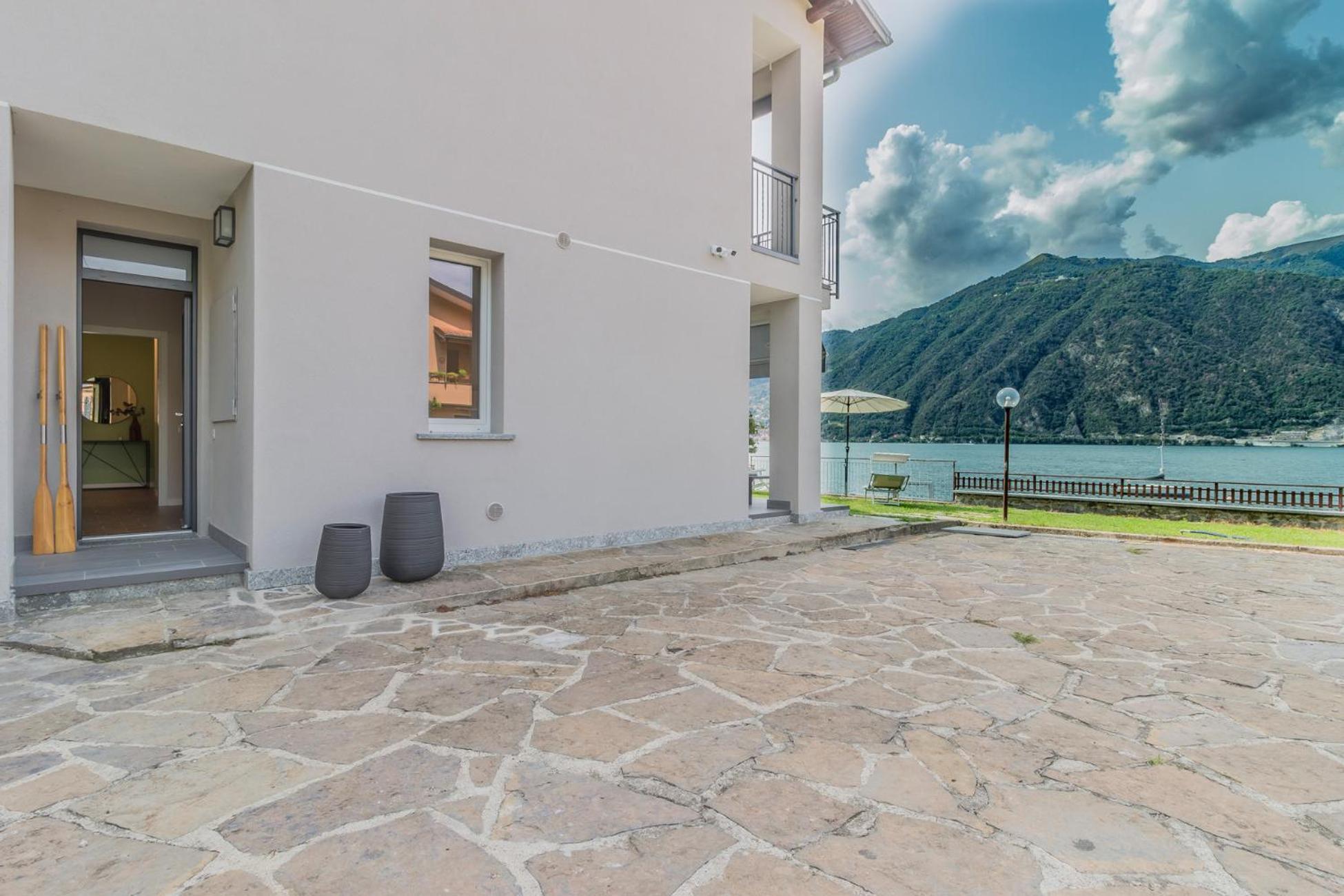 Ninfea Apartments By Wonderful Italy Lezzeno Bagian luar foto
