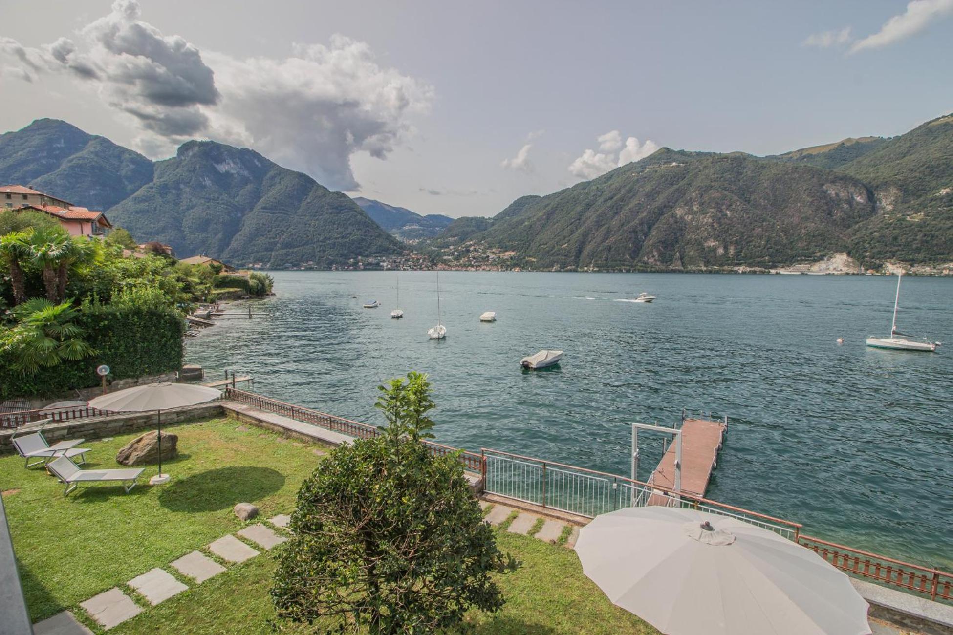 Ninfea Apartments By Wonderful Italy Lezzeno Bagian luar foto