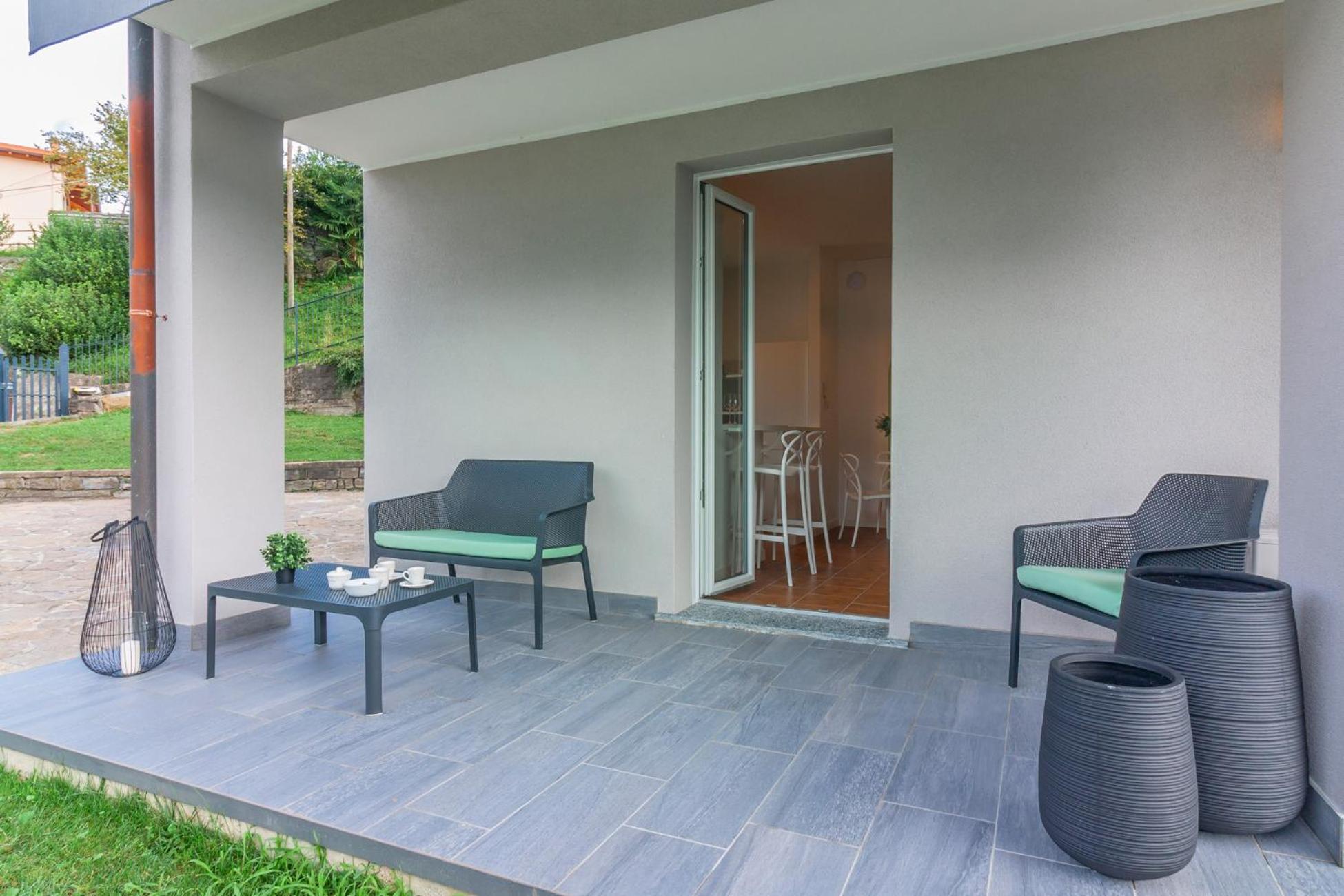 Ninfea Apartments By Wonderful Italy Lezzeno Bagian luar foto
